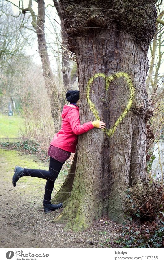 Happy woman hugs a big tree with a heart Young woman Youth (Young adults) Woman Adults 1 Human being 30 - 45 years Park Heart Sign Touch Love Embrace Authentic