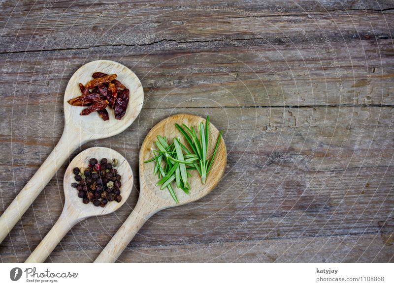 spices Pepper Peppercorn Herbs and spices Rosemary Cooking Kitchen Ingredients Wooden spoon Chili Dried Nutmeg Table Wooden table Near Close-up