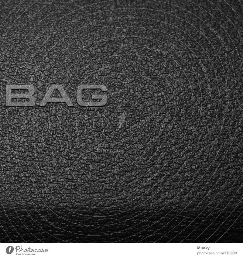 bag Air Airbag Gray Black Inscription Letters (alphabet) Safety Square Two-piece 2 Macro (Extreme close-up) Close-up Munky Car dashboard secure Shadow