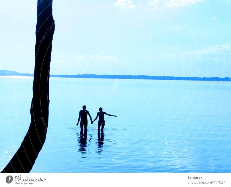 Freshly in love IV Lake Chiemsee Ocean Waves Reflection Clouds Bavaria Summer Vacation & Travel Lovers Cold Wet Hold hands Water Blue Coast Sky August Couple
