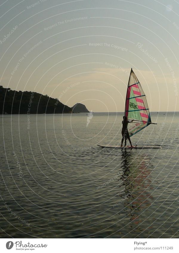 the surfer Surfer Windsurfing Places Ocean Vacation & Travel Woman Stand Calm Aquatics Healthy Leisure and hobbies Sky Water Blue Sail windwurfer Rock Bay Free