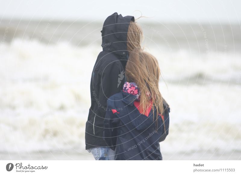 Two sisters play games - a Royalty Free Stock Photo from Photocase