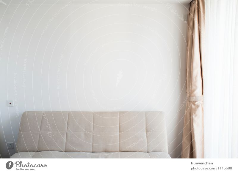 The Simple Room With Sofa And White Wall A Royalty Free