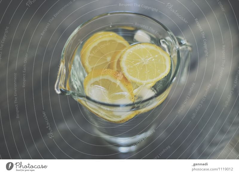 refreshment Food Beverage Drinking Cold drink Drinking water Lemonade Yellow Ice cube Water Decanter Healthy Colour photo Interior shot Studio shot Deserted