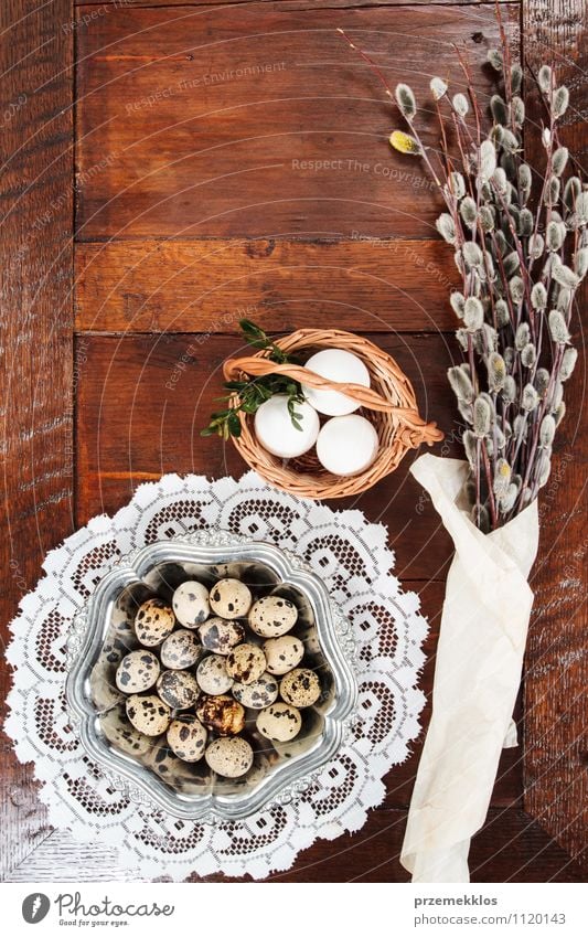 Easter composition of catkins and eggs on wooden table Decoration Table Spring Paper Wood Metal Natural Brown Tradition Basket bobwhite candid Copy Space Dish