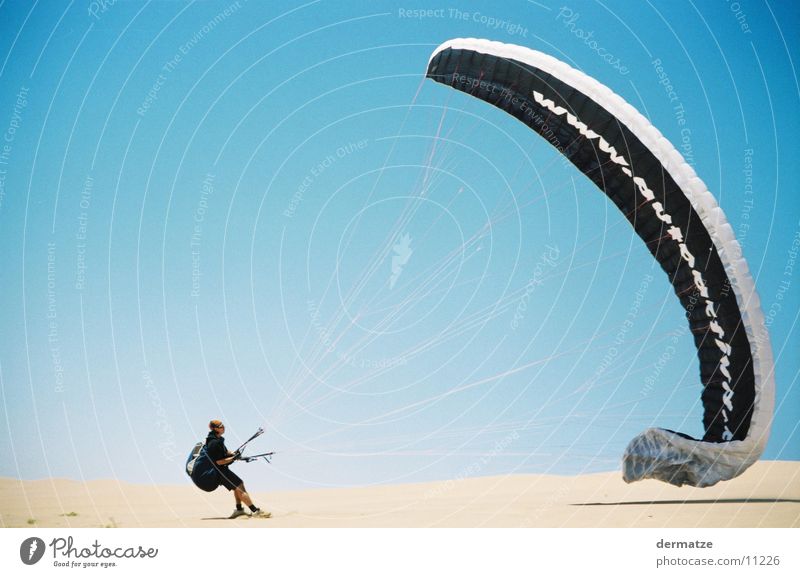 Gliders Heaven Paragliding Extreme sports copy text Wind Desert Sky fun