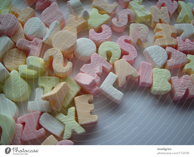 Colourful mixture Letters (alphabet) Multicoloured Pink White Yellow Candy Latin alphabet Orange candy colours Nutrition