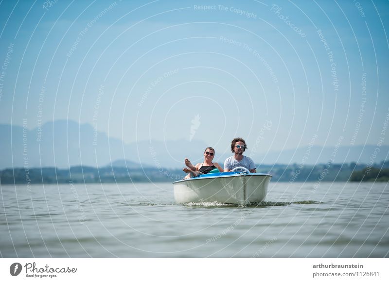 Young couple leisurely riding electric boat on the lake Leisure and hobbies Vacation & Travel Tourism Trip Summer Summer vacation Aquatics Human being Masculine