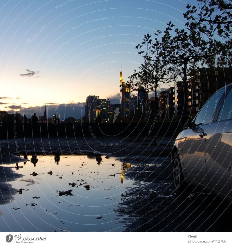 shores of mainhatten Twilight Town High-rise Frankfurt Main Puddle Reflection Light Lighting Silhouette Motor vehicle Car Parking lot Long exposure Dusk Skyline