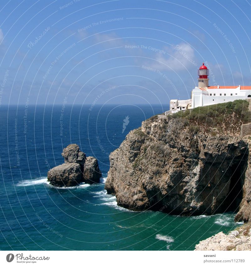 Lighthouse on cliff at Cabo São Vincente near Sagres in Portugal. Vacation & Travel Far-off places Freedom Summer Beach Ocean Waves