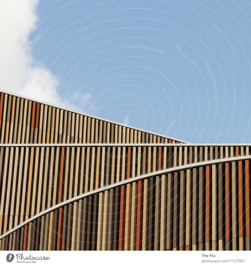 vanishing lines Sky Clouds Manmade structures Building Architecture Shopping malls Wall (barrier) Wall (building) Facade Roof Eaves Wood Metal Blue Brown Yellow