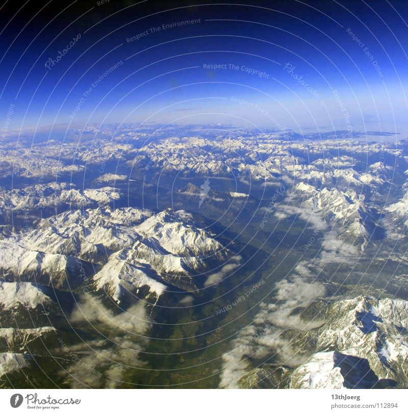 Alpine Cosmos Tourism Far-off places Freedom Mountain Gliding Pilot Career Aviation Media Environment Landscape Earth Air Clouds Horizon Climate Snow Alps Peak