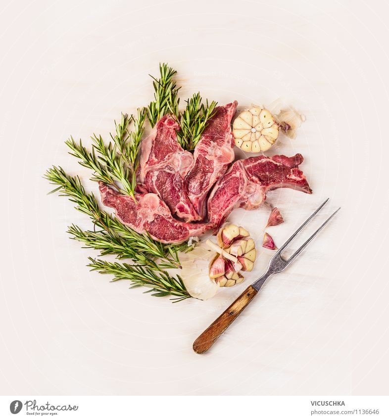 Lamb, rosemary and garlic with meat fork Food Fish Herbs and spices Nutrition Dinner Banquet Organic produce Diet Fork Style Design Healthy Eating Life Table