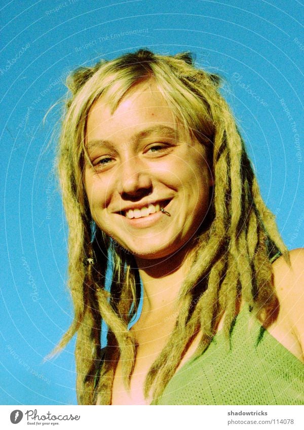smile Woman Dreadlocks Blonde Hair and hairstyles Reggae Style Alternative Portrait photograph Whim Good Happiness Human being Laughter funky Sky Eyes Mouth