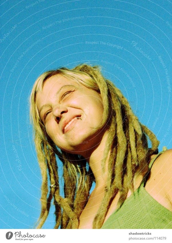A smile for the sun Woman Dreadlocks Blonde Hair and hairstyles Reggae Style Alternative Portrait photograph Whim Good Happiness Human being Laughter funky Sky
