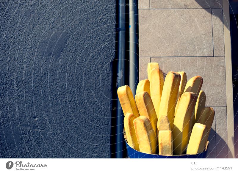 One large French fries, please. Nutrition Eating Lunch Fast food Beautiful weather Wall (barrier) Wall (building) Snack bar Delicious Appetite Voracious