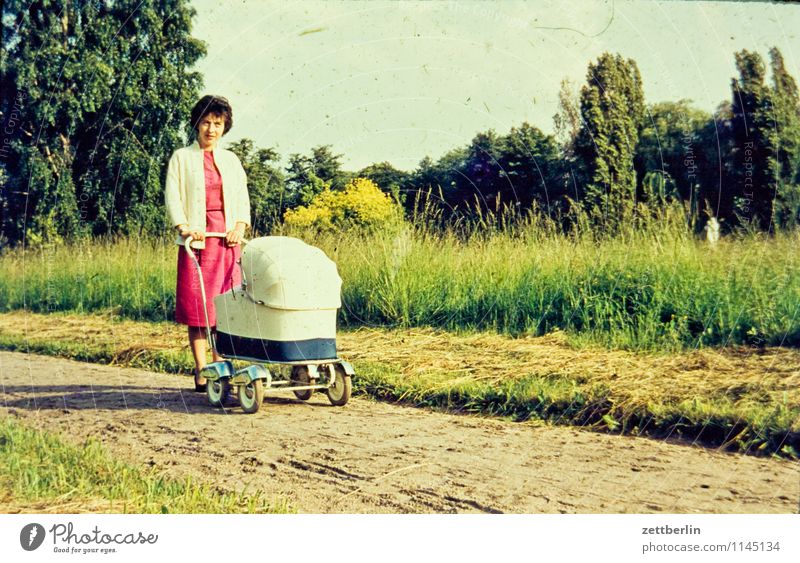 Mother with pram, 1960 Family & Relations Family outing Family planning Domestic happiness Related Past Child Infancy Childhood memory Memory The fifties