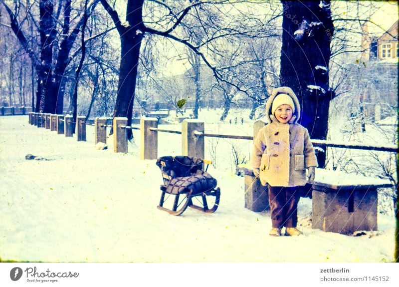 Child with sled, winter 1963 Family & Relations Family outing Domestic happiness Related Past Infancy Childhood memory Memory The fifties Sixties Fashion