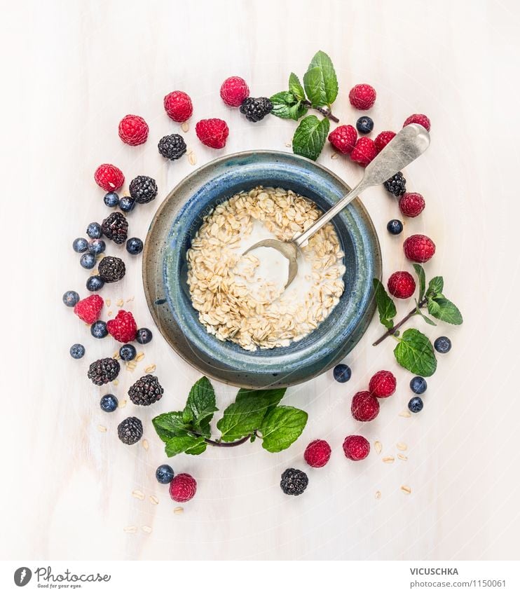 Healthy breakfast - oatmeal with milk and berries Food Dairy Products Fruit Grain Herbs and spices Nutrition Breakfast Organic produce Vegetarian diet Diet Milk