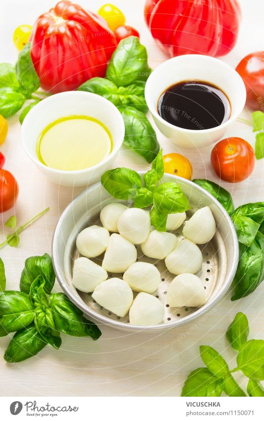 Fresh tomatoes, mozzarella and basil Food Vegetable Lettuce Salad Herbs and spices Cooking oil Lunch Buffet Brunch Picnic Organic produce Vegetarian diet Diet