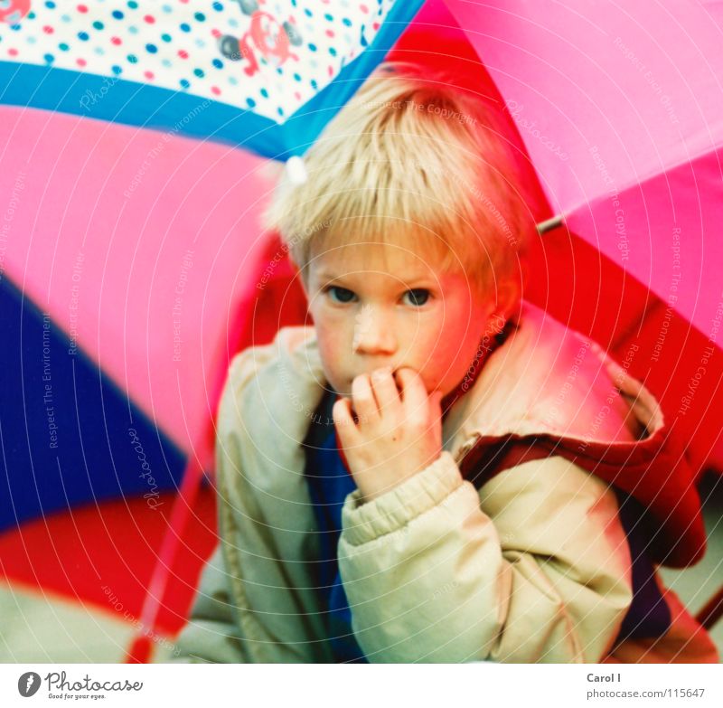 umbrella hut Girl Blonde White Jacket Doe eyes Yellow Cute Sweet Small Playing Child Pink Timidity Fingers Hooded (clothing) Think Joy Toddler fratz Looking Sit
