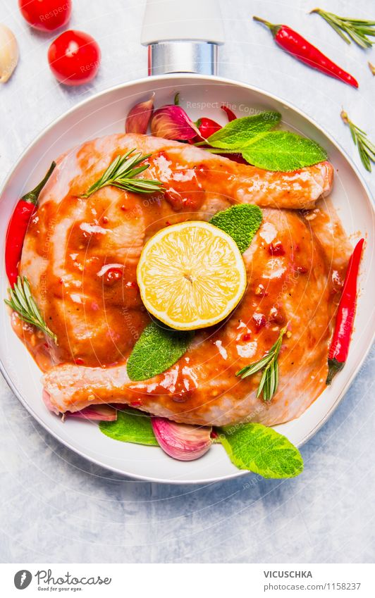 Hot chicken legs with lemon and sage Food Meat Herbs and spices Cooking oil Lunch Banquet Organic produce Diet Pan Style Design Healthy Eating Life Table