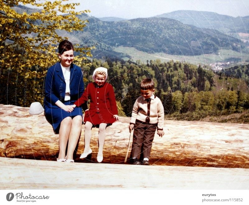 Sunday trip. Tree trunk Mother Child Girl Vacation & Travel Forest Black Forest Clothing Dress Leaf Spring Footwear Seventies Sixties Old-school