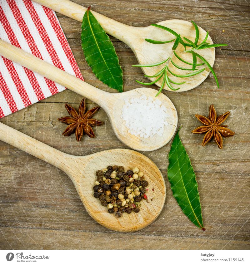 spices Herbs and spices Pepper Wooden spoon Peppercorn Rosemary Cooking sea salt Star aniseed Kitchen Ingredients Country house Table Wooden table Near Close-up