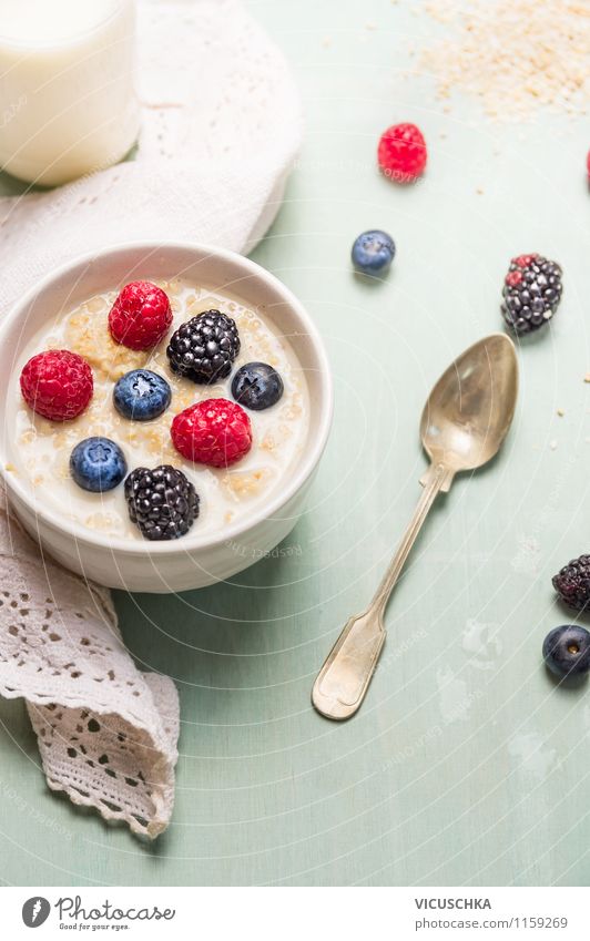 Healthy breakfast with oat bran, milk and berries Food Dairy Products Fruit Grain Nutrition Breakfast Organic produce Vegetarian diet Diet Milk Plate Bowl