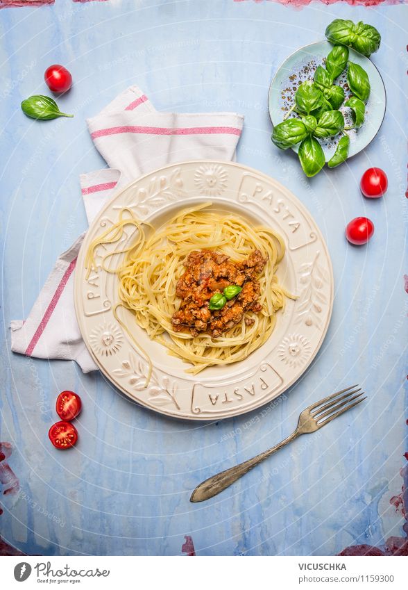 Lunch plate with spaghetti Bolognese Food Meat Vegetable Herbs and spices Cooking oil Nutrition Organic produce Italian Food Crockery Plate Fork Style Design