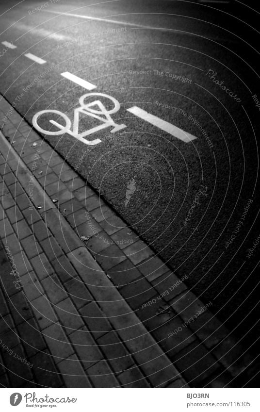 also laid flat ;) Concrete Night Graphic White Dark Cycle path Logo Bicycle Curbside Night shot Portrait format Vertical Pave Photos of everyday life Transport