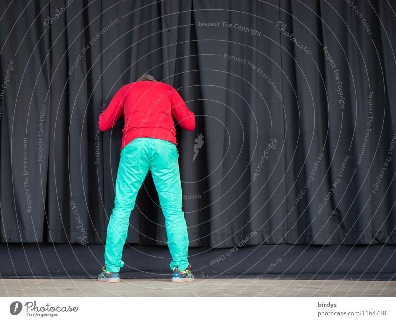 Man in colorful outfit curiously pokes his head through closed curtain Masculine Young man Youth (Young adults) Adults 1 Human being 18 - 30 years 30 - 45 years
