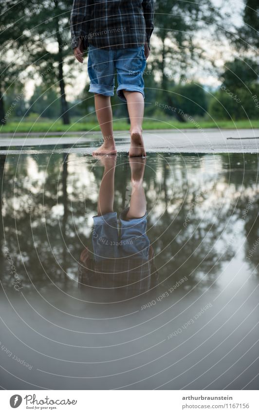 Boy walks in puddle of water Healthy Leisure and hobbies Playing Summer Parenting Kindergarten Child Human being Masculine Boy (child) Infancy Life 1
