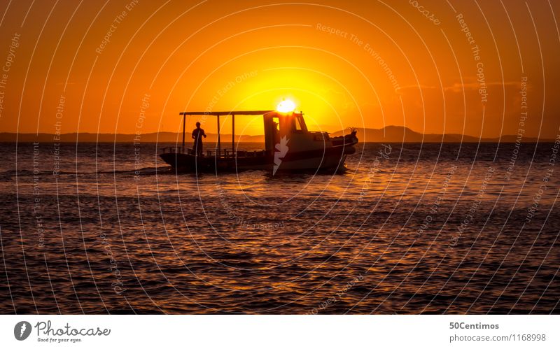 The fishing boat at sunset Fishery 1 Human being Nature Sunrise Sunset Beautiful weather Mountain Ocean Navigation Fishing boat Motorboat Vacation & Travel