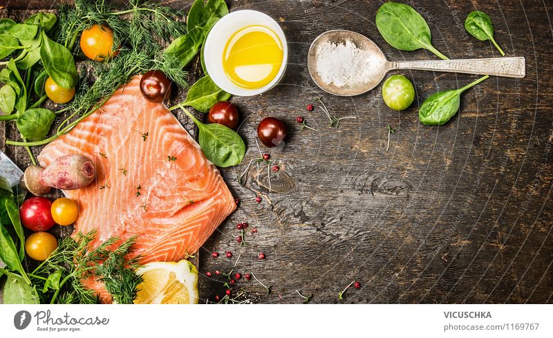 salmon, fresh herbs, oil and spoon on old wooden table Food Fish Vegetable Herbs and spices Cooking oil Nutrition Lunch Dinner Banquet Organic produce