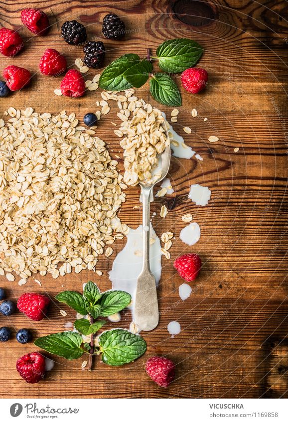 Prepare breakfast with oatmeal and berries Food Fruit Grain Nutrition Breakfast Organic produce Vegetarian diet Diet Milk Spoon Style Design Healthy Eating Life