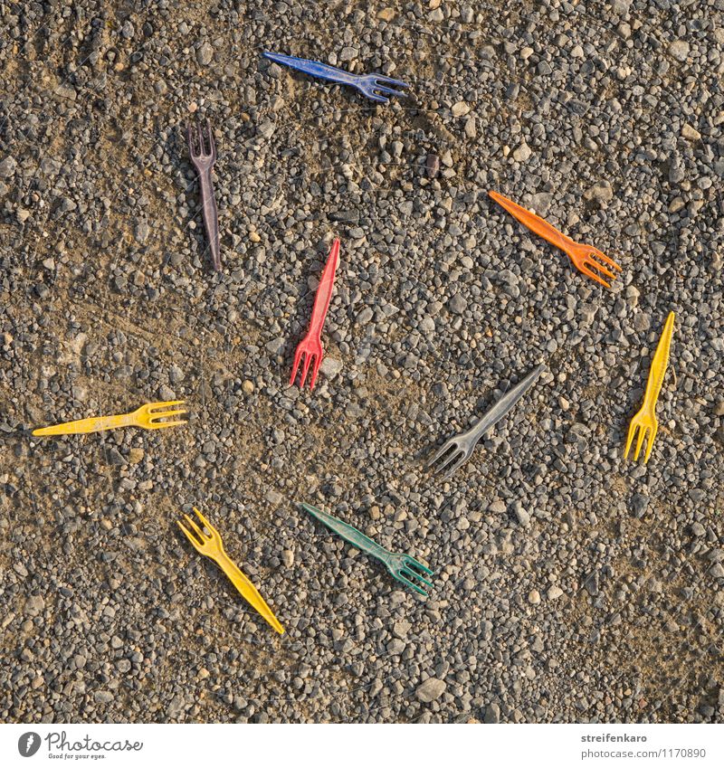 Coloured plastic french fries forks lie in a mess on the floor French fries Eating Lunch Dinner Fast food Snack bar Fork Overweight Relaxation Going out