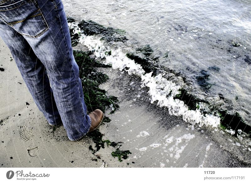 Day at the sea Ocean Waves Foam Algae Low tide Current Boots Netherlands Lake Grain of sand Sand Legs High tide Jeans