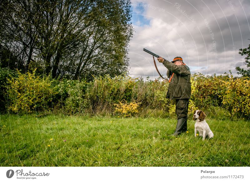 Hunter in the nature Leisure and hobbies Playing Hunting Sports Human being Man Adults 30 - 45 years 45 - 60 years 60 years and older Senior citizen Nature