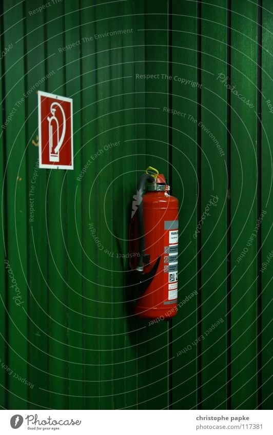 study in red/green or: the same in green Green Extinguisher Fire prevention Wood Panels Wall (building) Lecture hall Pictogram Rescue Erase Safety Dangerous