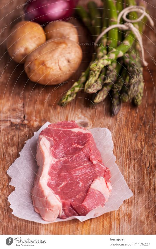 victuals Food Meat Vegetable Nutrition Organic produce Cheap Good Raw Steak beef steak Asparagus Potatoes Onion Rustic Wooden board Paper Fat loin of beef Loin