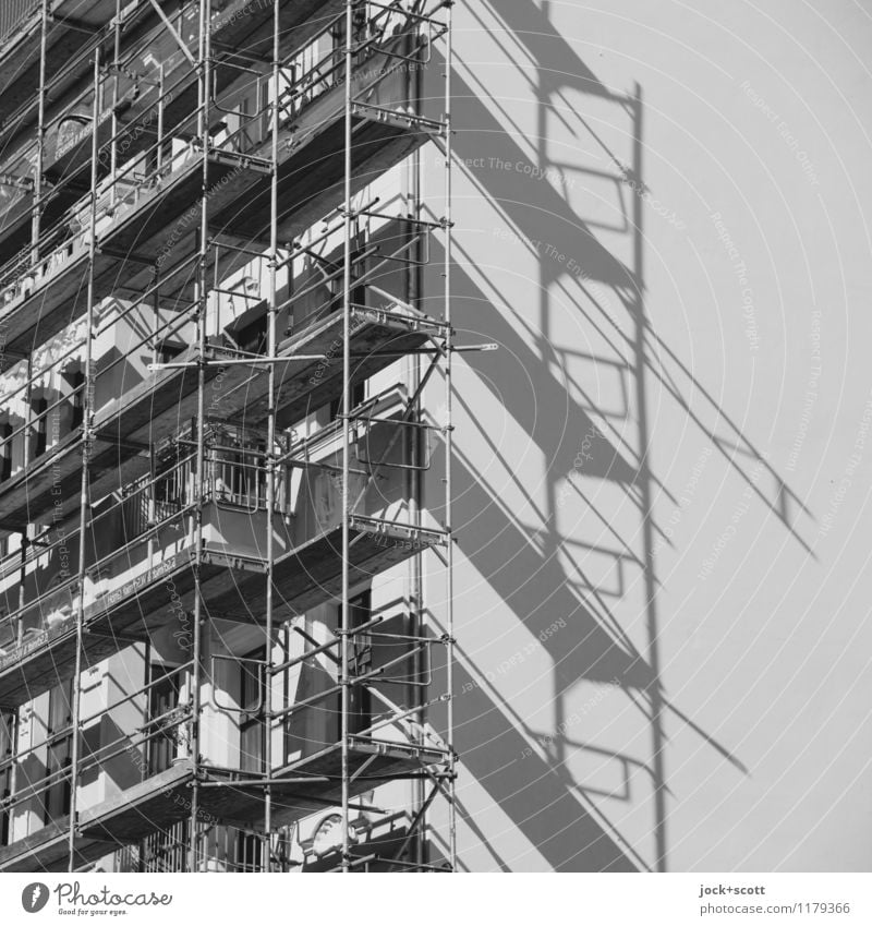 Scaffold on work in progress Construction site Prenzlauer Berg Facade Fire wall Build Authentic Sharp-edged Safety Symmetry Change Shadow play Drop shadow
