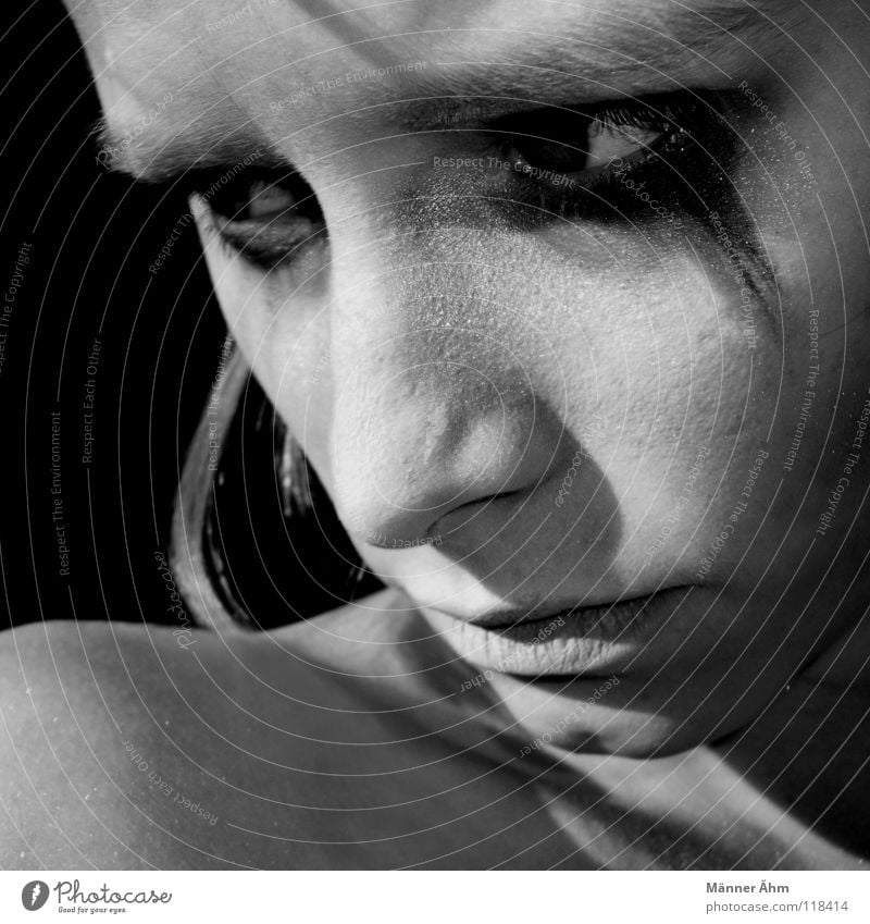 Woman blindfolded crying black tears - a Royalty Free Stock Photo from  Photocase