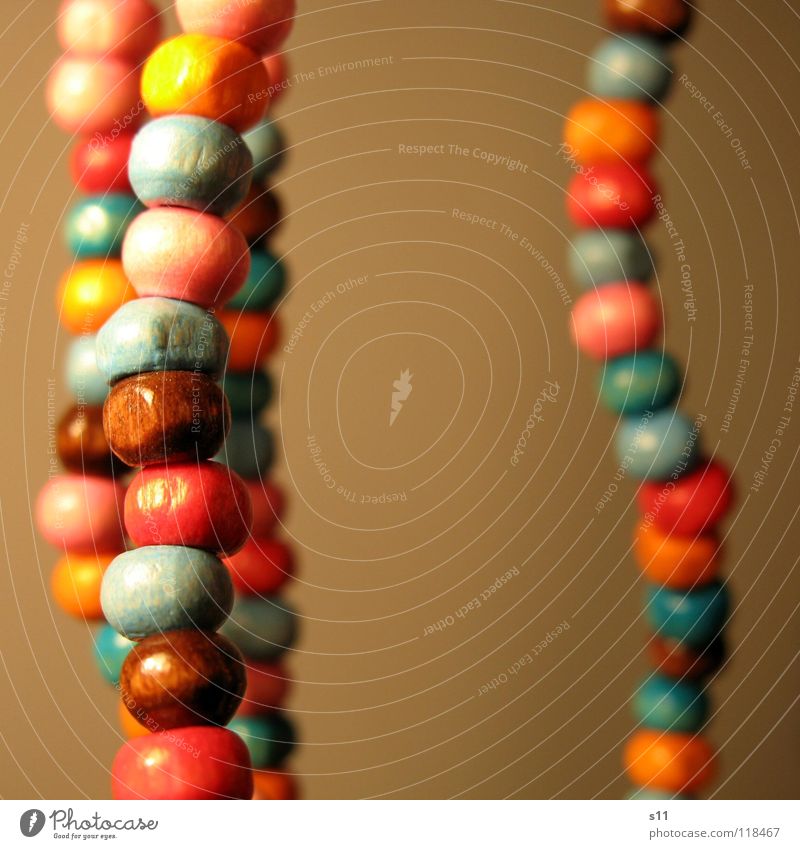 ornament Beautiful Decoration Jewellery Wood Blue Brown Pink Pearl necklace Wooden bead Neck Chain Orange distortion Close-up Macro (Extreme close-up)