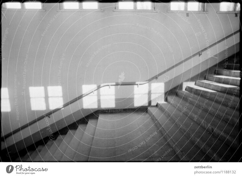 Hohen Neuendorf, 1984 Stairs Level Landing Black & white photo Sun Window Light Shadow Handrail Banister Go up Descent Copy Space Copy Space top