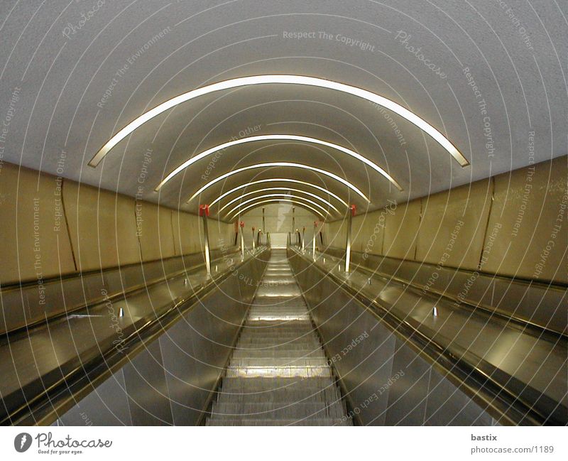 b:escalator:01 Technology Stairs Escalator Electrical equipment Colour photo Arch Central perspective Interior shot Deserted Downward Tunnel lighting