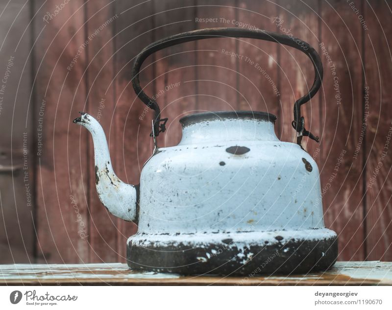 Shiny Vintage Metal Coffee Pot On White Table Stock Photo, Picture