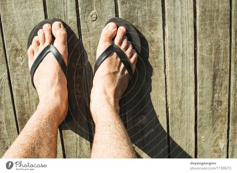 Foot in thongs Joy - a Royalty Free Stock Photo from Photocase