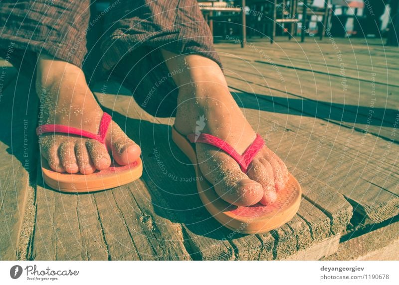 Foot in thongs Joy - a Royalty Free Stock Photo from Photocase