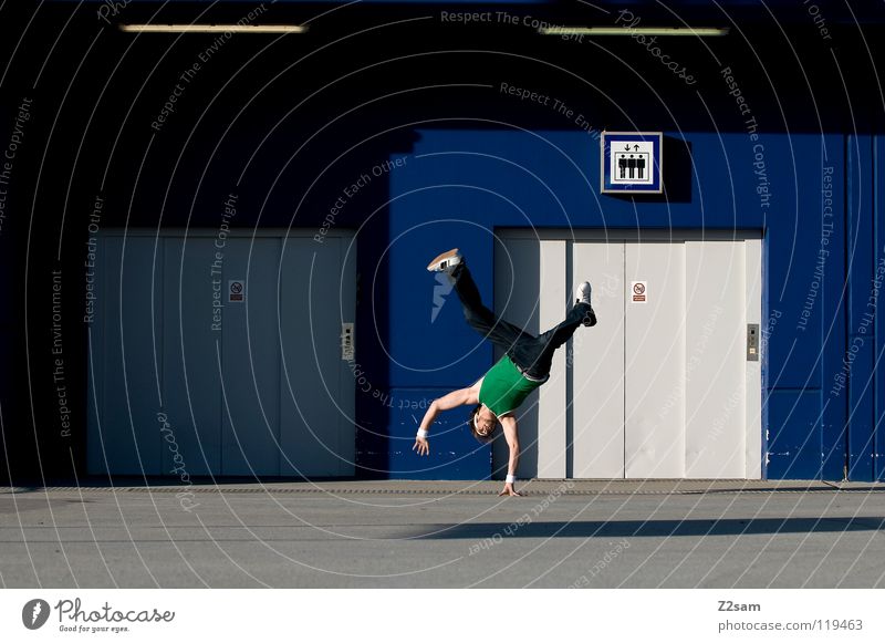 handplant Elevator Concrete Roof Green Handstand Hip-hop Youth culture Man Sports top Sleeveless t-shirt Masculine Parking level Parking garage